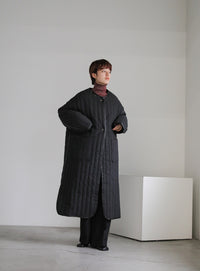 キルティングパイピングロングコート