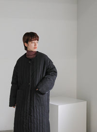 キルティングパイピングロングコート