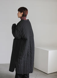 キルティングパイピングロングコート