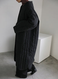 キルティングパイピングロングコート