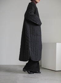 キルティングパイピングロングコート