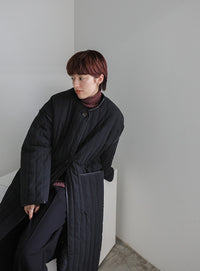 キルティングパイピングロングコート