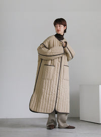 キルティングパイピングロングコート