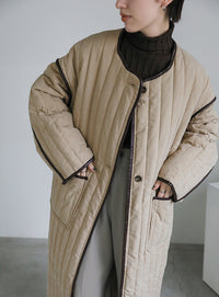 キルティングパイピングロングコート