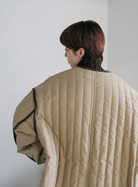 キルティングパイピングロングコート