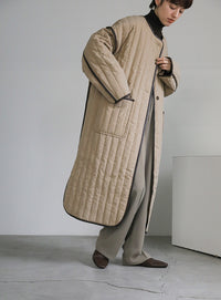 キルティングパイピングロングコート