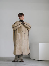 キルティングパイピングロングコート