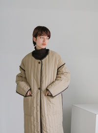 キルティングパイピングロングコート