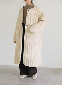 キルティングパイピングロングコート