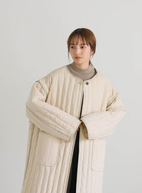 キルティングパイピングロングコート