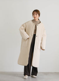 キルティングパイピングロングコート