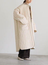 キルティングパイピングロングコート