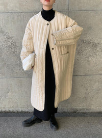 キルティングパイピングロングコート