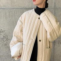 キルティングパイピングロングコート