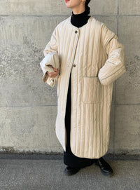 キルティングパイピングロングコート