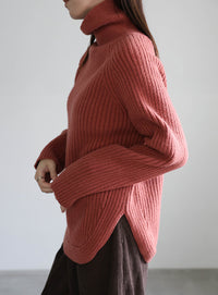 タートルネックラウンドリブニット