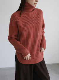 タートルネックラウンドリブニット