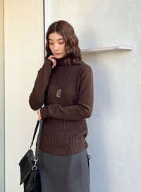 ランダムリブタートルニット