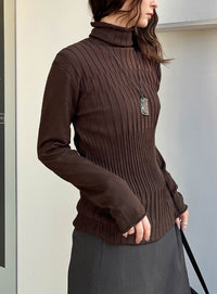 ランダムリブタートルニット