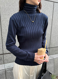 ランダムリブタートルニット