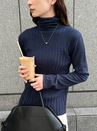 ランダムリブタートルニット