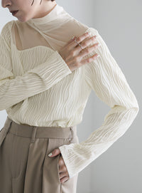 ハイネックシアーウェーブトップス