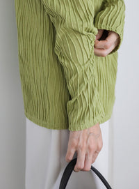 ハイネックシアーウェーブトップス