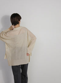 チェックパターンシアーポロニット