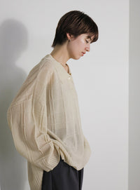 チェックパターンシアーポロニット