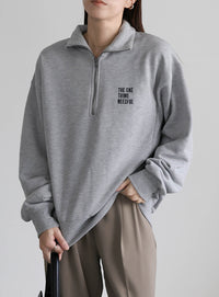 スウェットハーフジップトップス