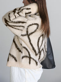 ニュアンスラインニットカーディガン