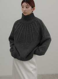 ミックスケーブルハイネックニット