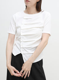 アシメボタンデザイントップス