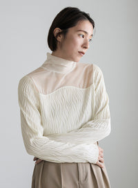 ハイネックシアーウェーブトップス