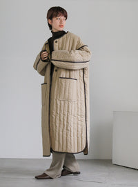 キルティングパイピングロングコート