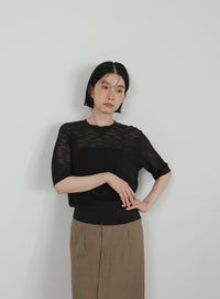 リブ編みシアークルーネックニット
