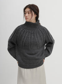 ミックスケーブルハイネックニット