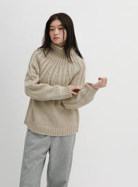 ミックスケーブルハイネックニット