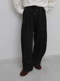 ツータックドロストスウェットパンツ